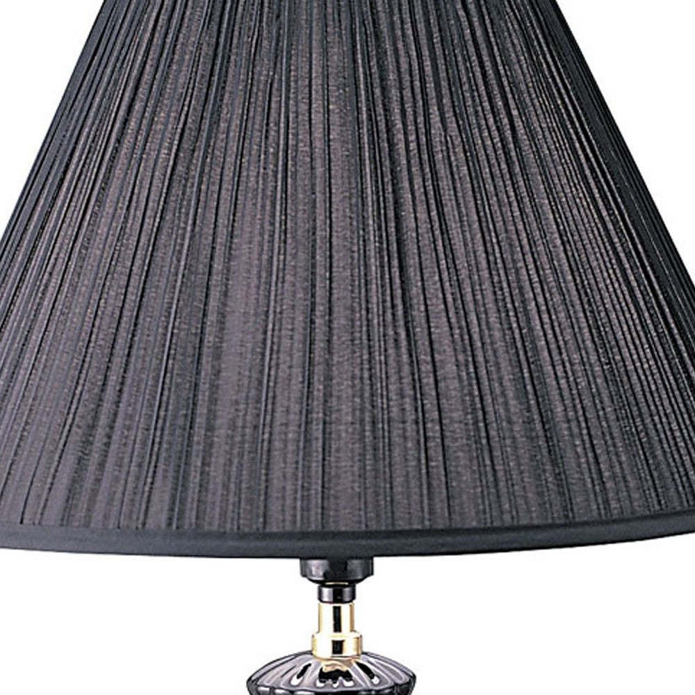 HomeRoots 26” Stylish Black Ceramic Urn Shape Table Lamp With Gold Base Finish