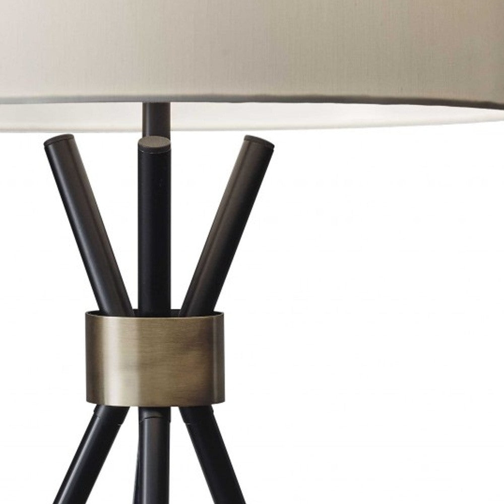 HomeRoots Metal Tripod Leg in Black with Antique Brass Accent Table Lamp
