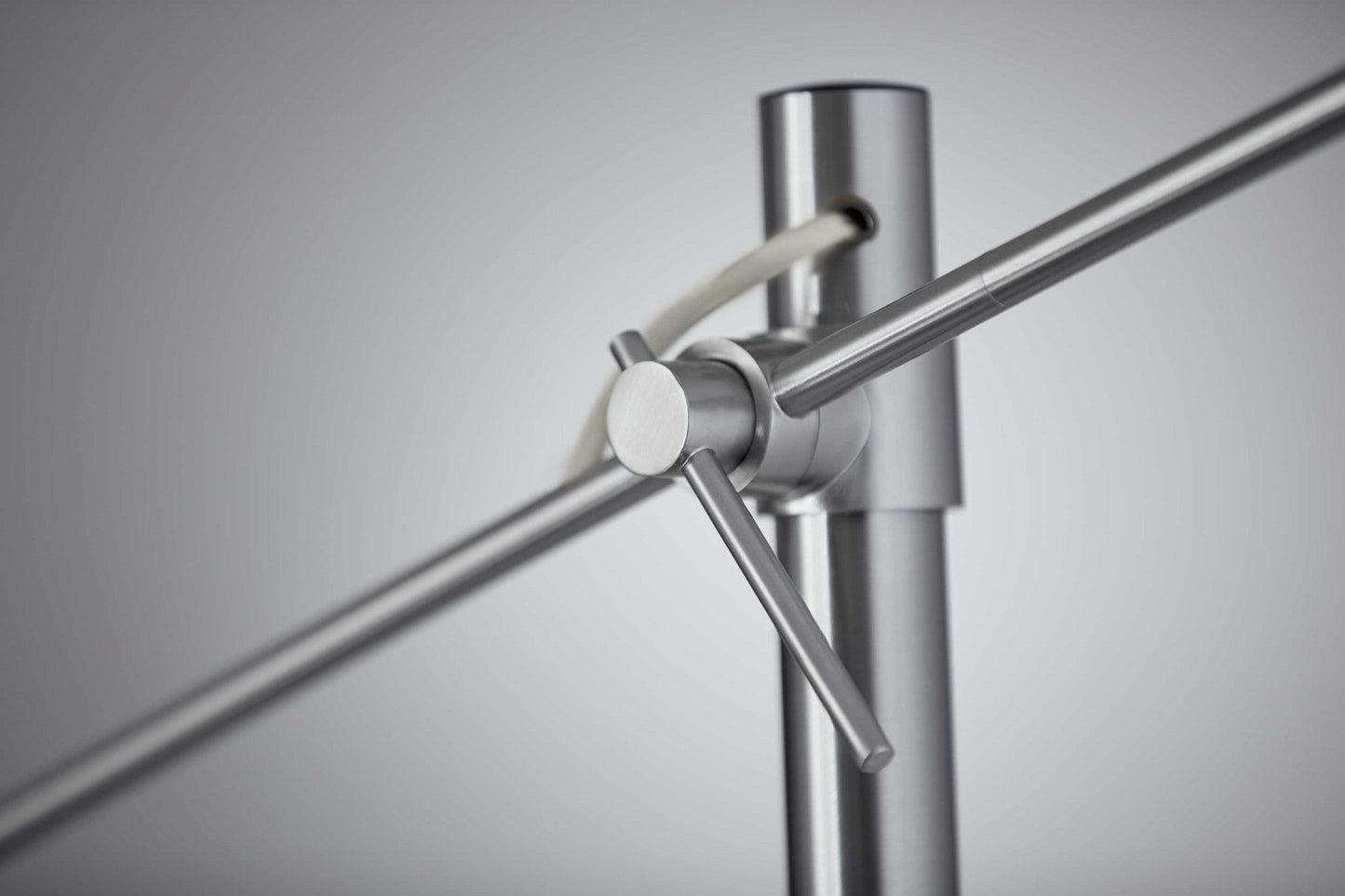 HomeRoots Two Light Floor Lamp With Adjustable Long Arm in Brushed Steel Finish