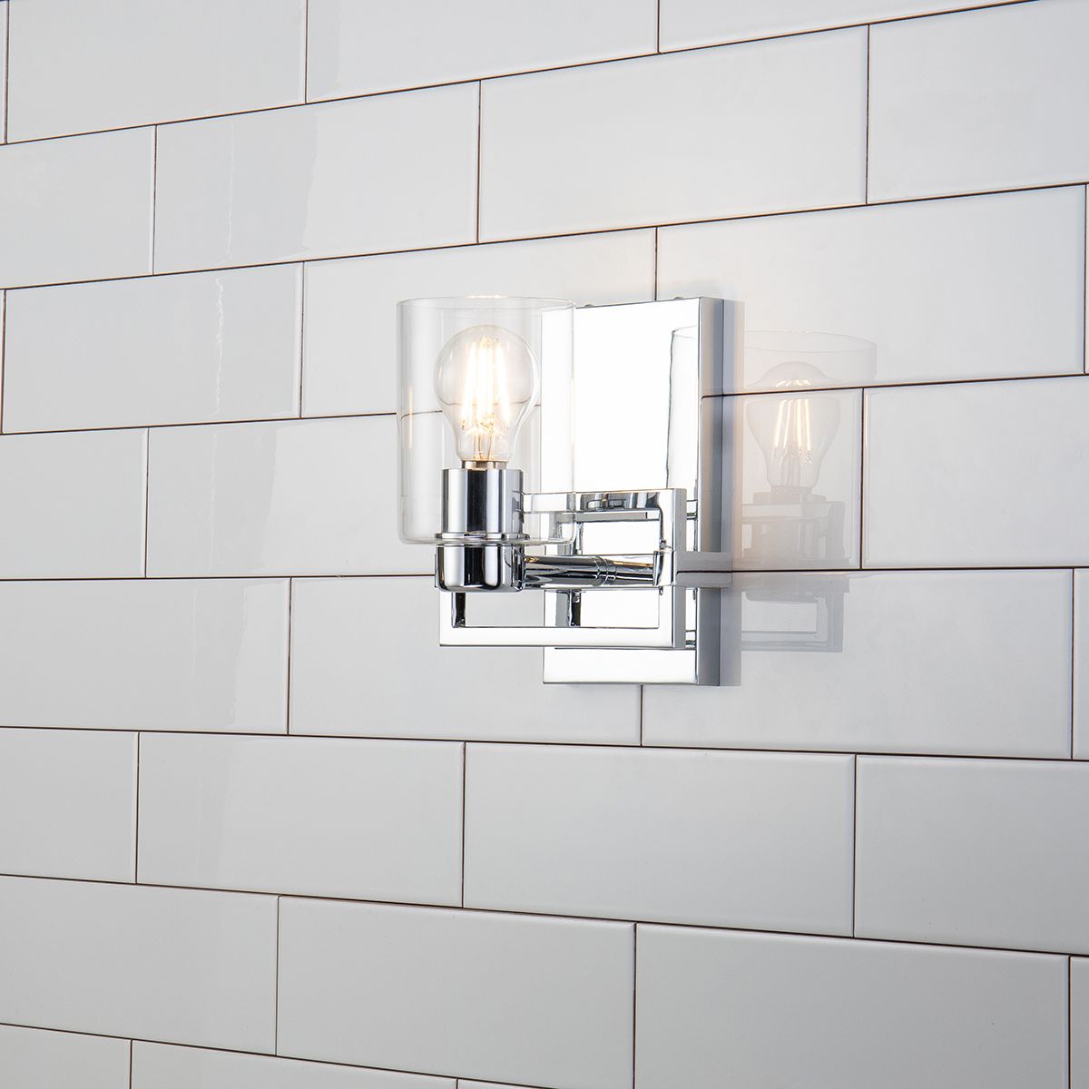 Lucas & McKearn Estes 1-Light Polished Chrome Wall Light With Cylinder Shape Clear Glass Shade