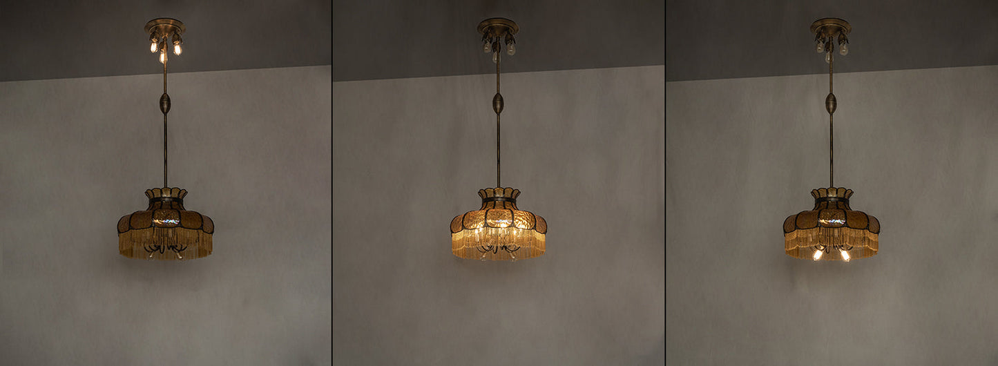 Meyda Lighting Frederick 24" 11-Light Antique Brass Pendant Light With Iridized Amber Art Shade Glass