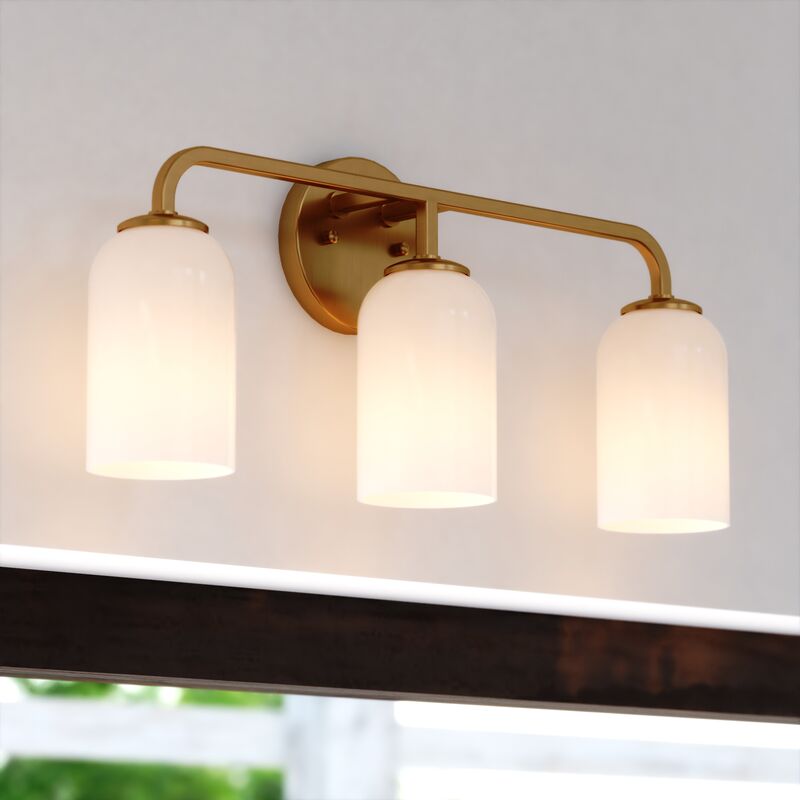 Vaxcel Shelby 23-in. 3 Light Vanity Natural Brass
