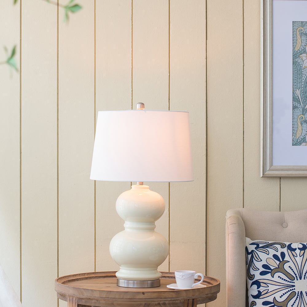A&B Home 15" x 27" Buttery Yellow Stacked Globe Ceramic Table Lamp With Ivory Drum Shade