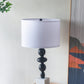 A&B Home 15" x 30" Bundle of 12 Black and White Table Lamp with Round Four Tiered Body