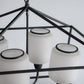 A&B Home 26" x 22" 4-Light Geometric Shape Black Metal Frame and Opaque Glass Chandelier