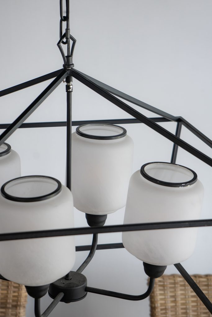 A&B Home 26" x 22" 4-Light Geometric Shape Black Metal Frame and Opaque Glass Chandelier