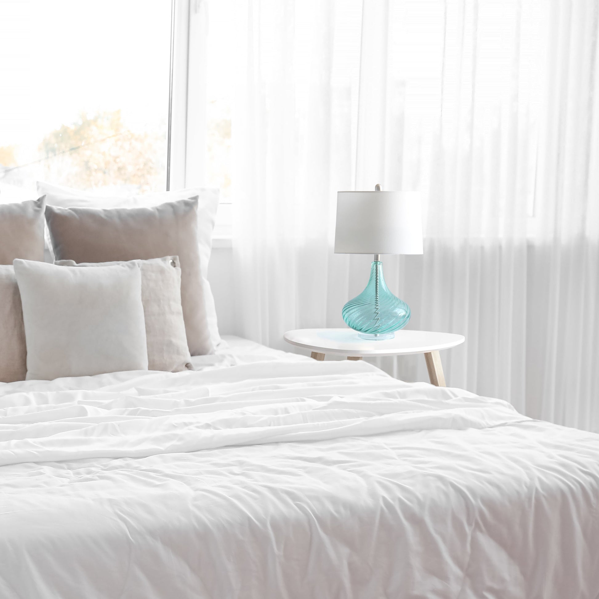 All The Rages Lalia Home 24" Blue Classix Contemporary Wavy Colored Glass Table Lamp With White Linen Shade
