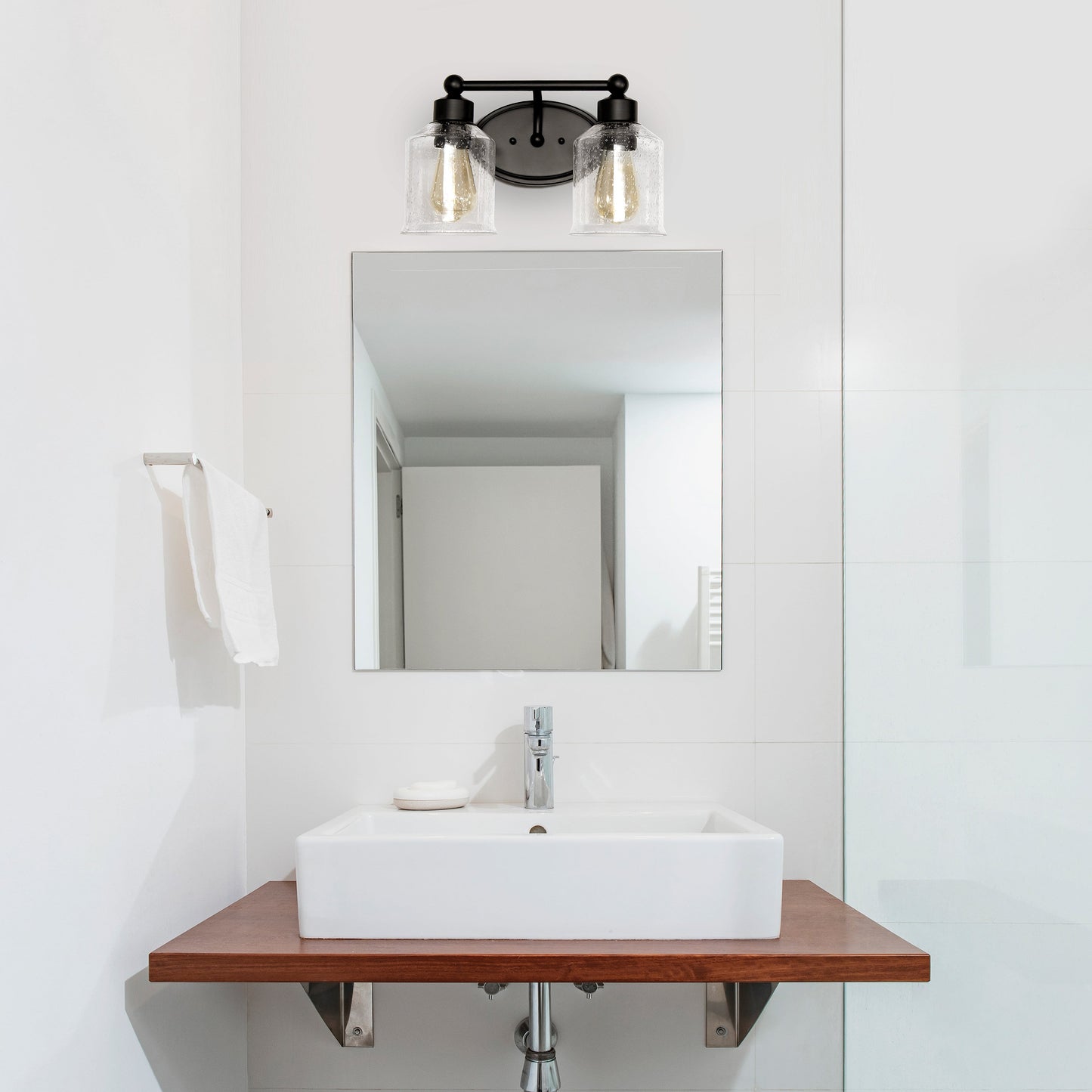All The Rages Lalia Home Black Studio Loft Modern 2-Light Metal Vanity Light With Clear Seeded Glass Shades