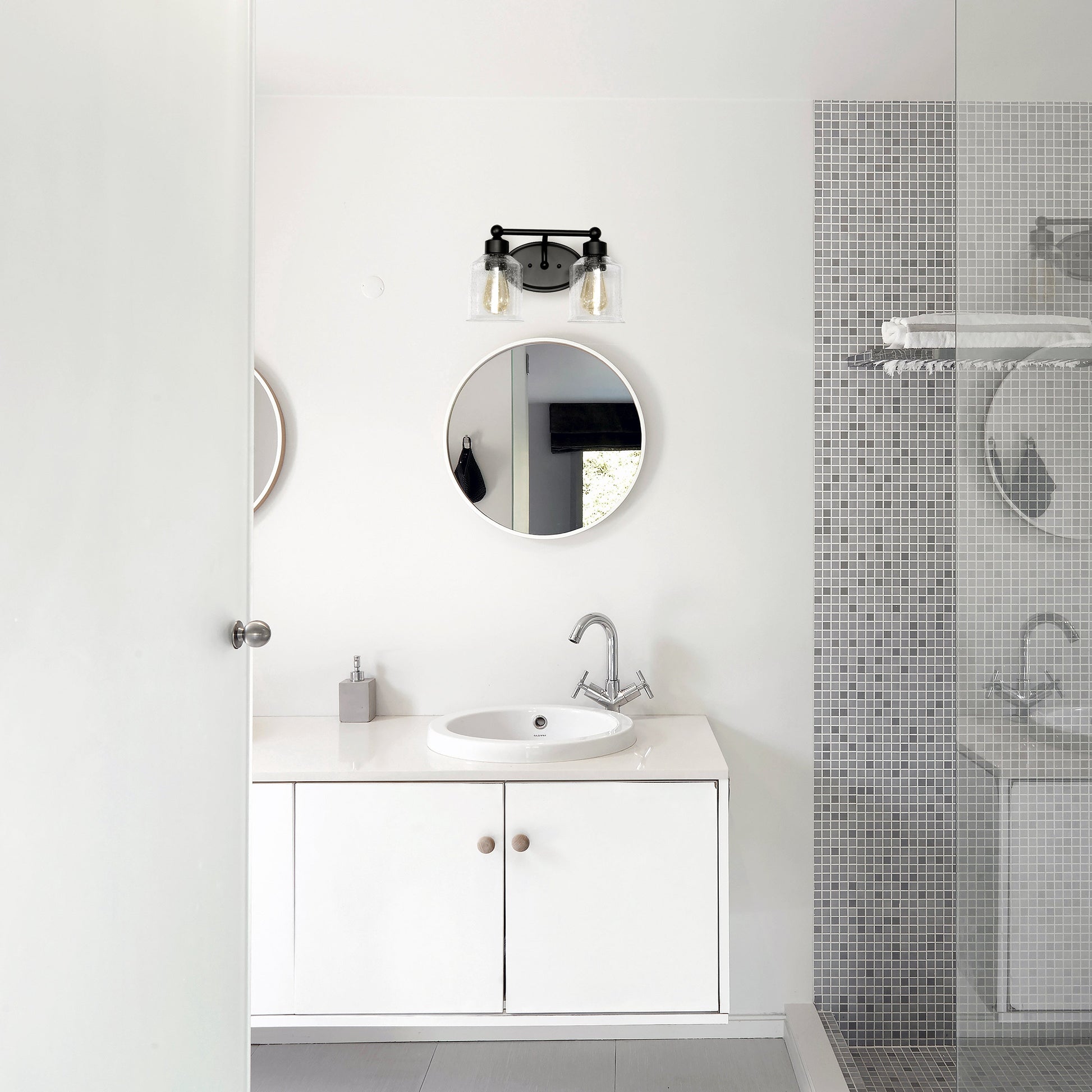 All The Rages Lalia Home Black Studio Loft Modern 2-Light Metal Vanity Light With Clear Seeded Glass Shades