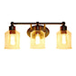 All The Rages Lalia Home Black Studio Loft Modern 3-Light Metal Vanity Light With Clear Seeded Glass Shades
