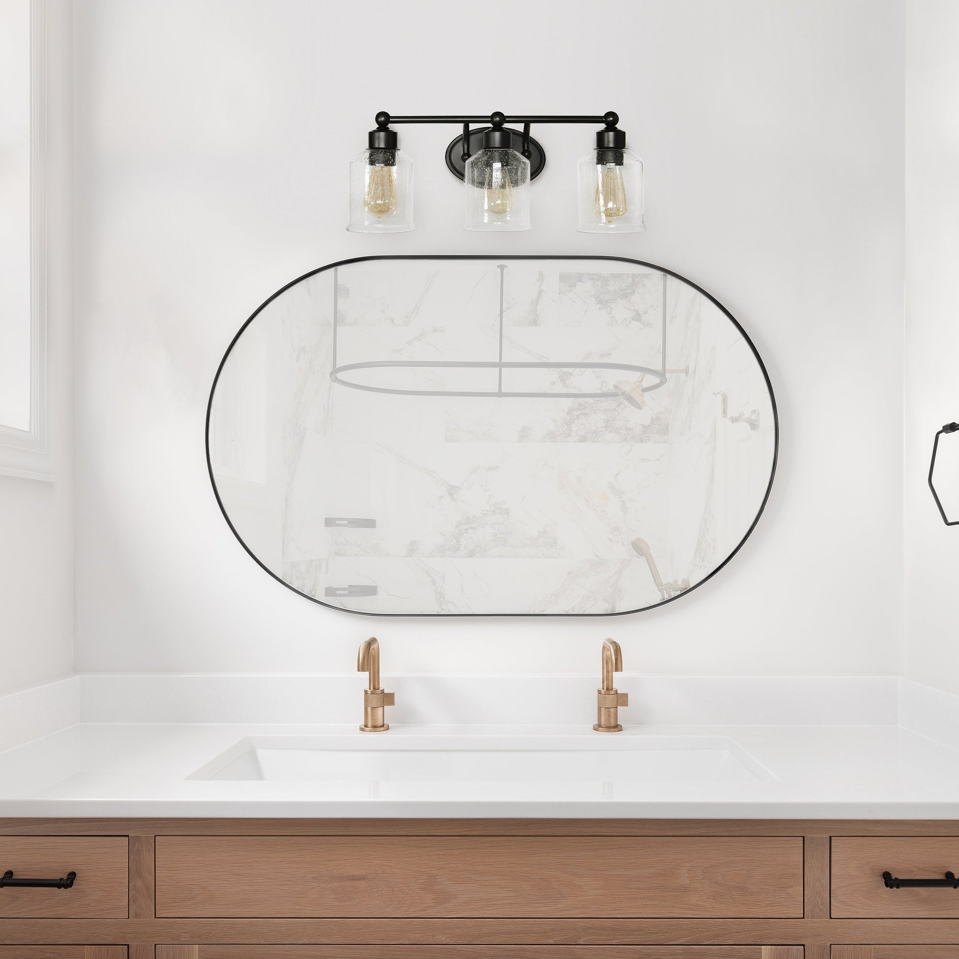 All The Rages Lalia Home Black Studio Loft Modern 3-Light Metal Vanity Light With Clear Seeded Glass Shades