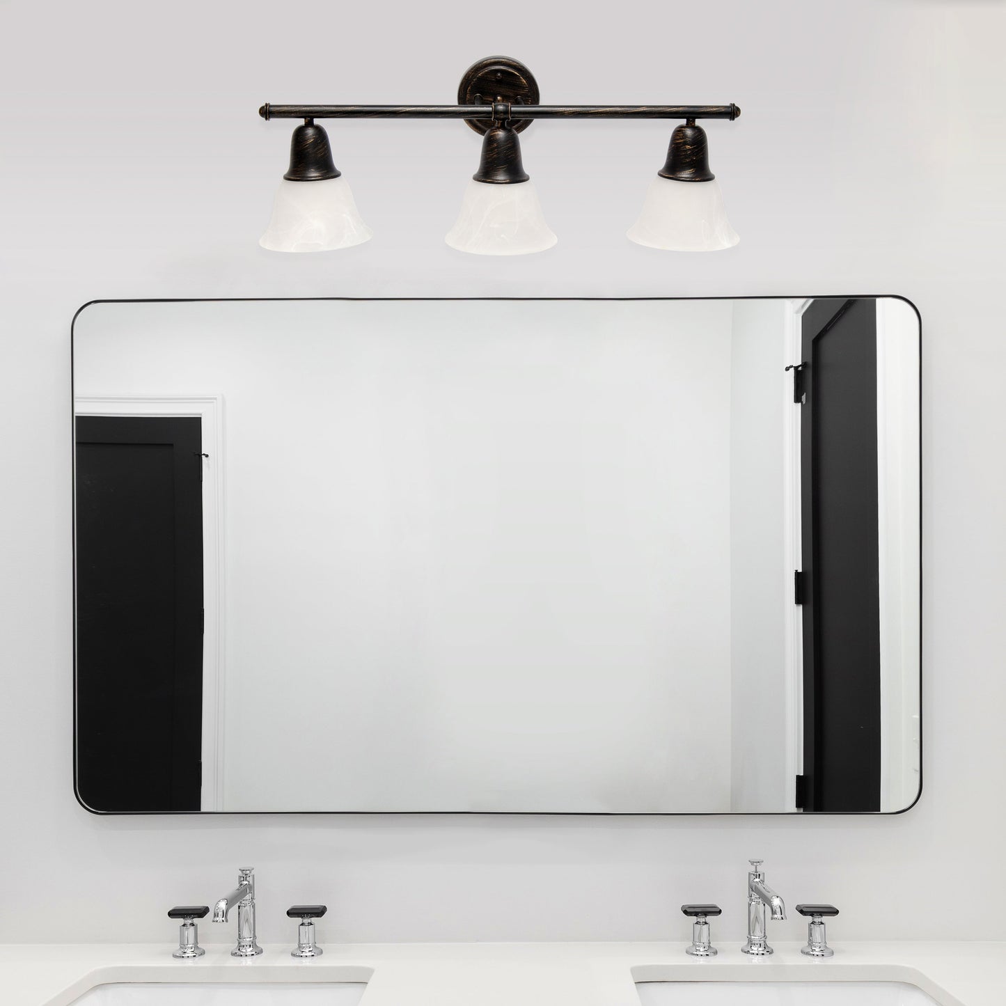 All The Rages Lalia Home Essentix Oil Rubbed Bronze 3-Light Vanity Light With Bell-Shaped Alabaster White Glass Shades