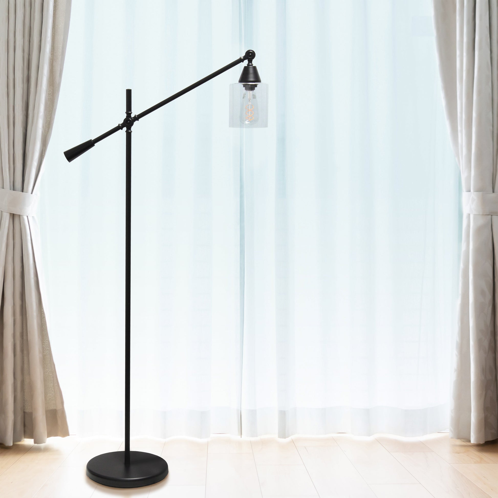 All The Rages Lalia Home Matte Black Swing Arm Floor Lamp With Clear Glass Cylindrical Shade