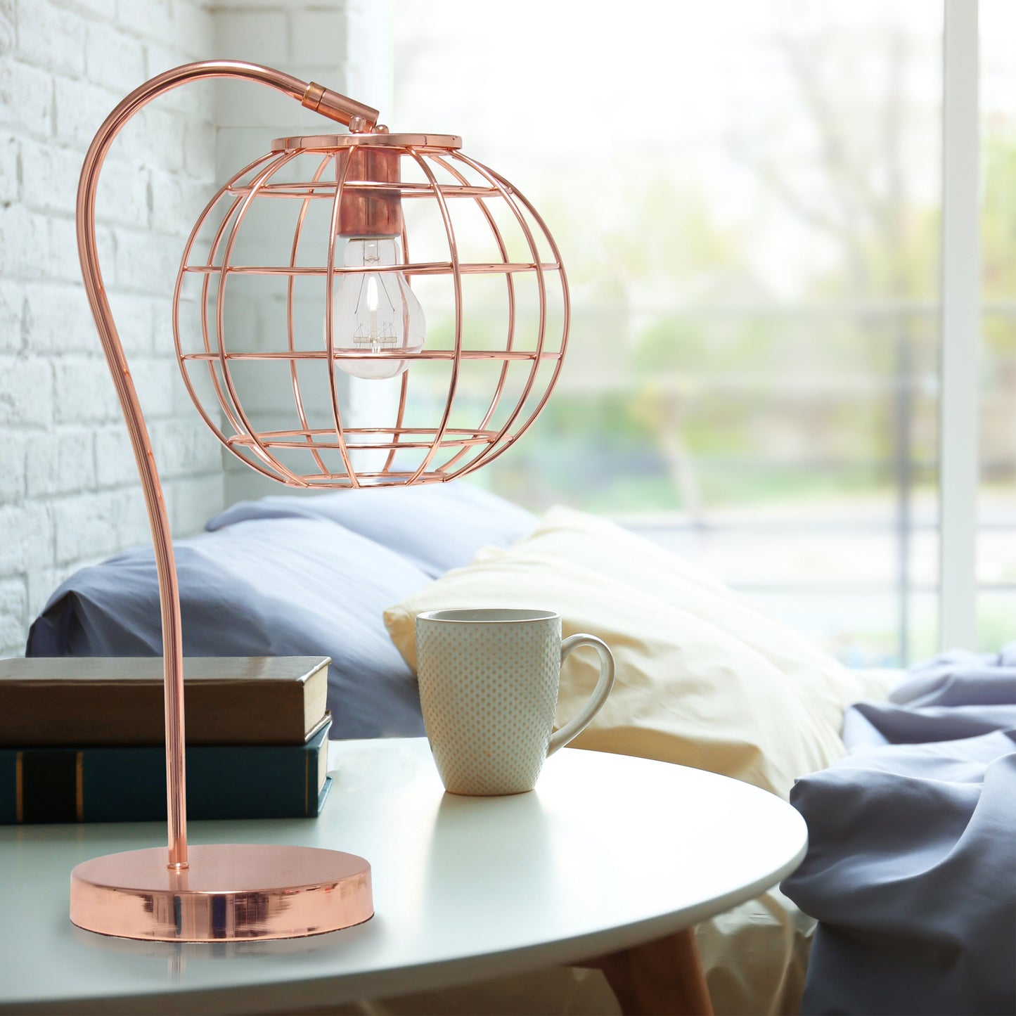 All The Rages Lalia Home Rose Gold Arched Metal Cage Table Lamp
