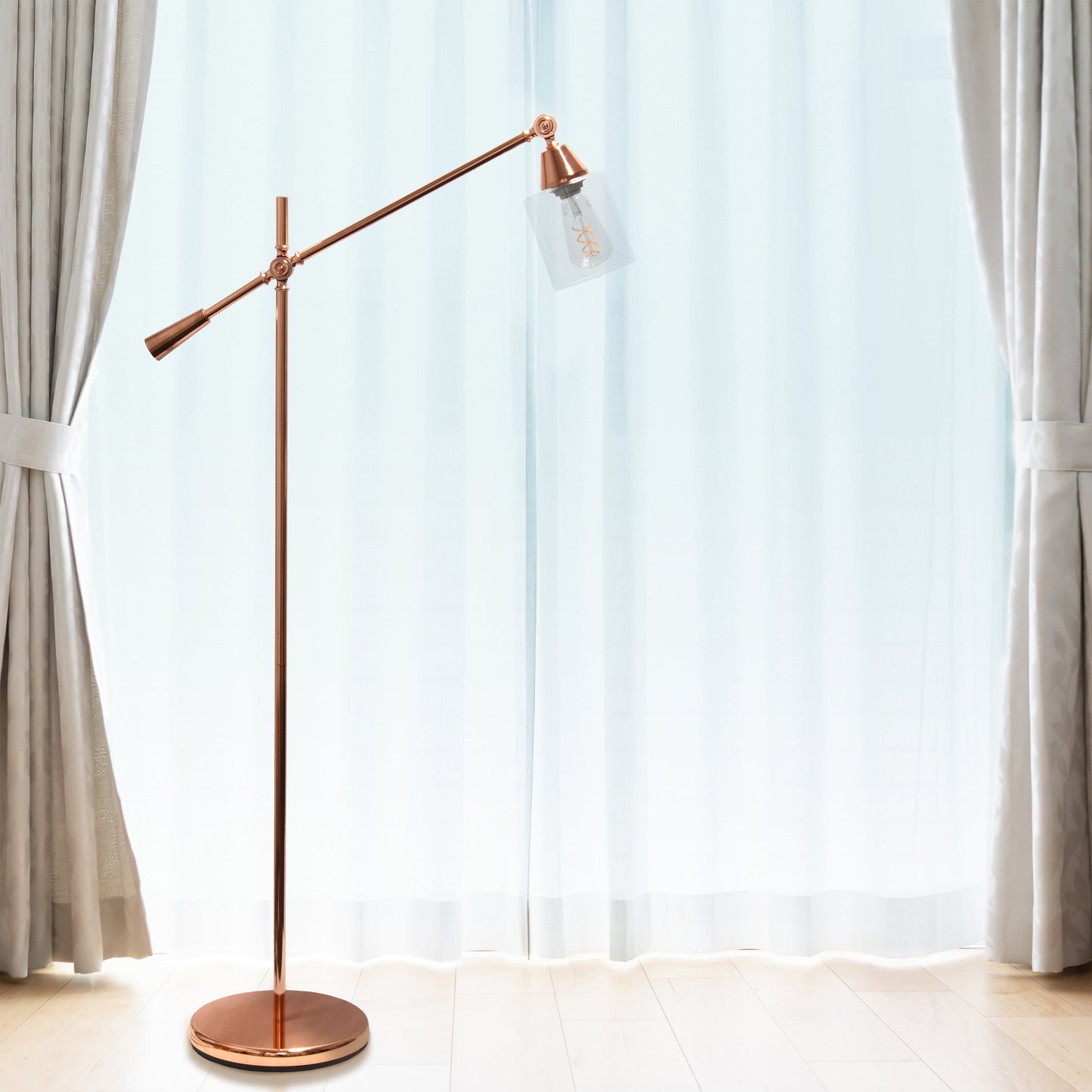 All The Rages Lalia Home Rose Gold Swing Arm Floor Lamp With Clear Glass Cylindrical Shade