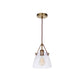 Craftmade Hagen 8" 1-Light Vintage Brass Pendant Light With Clear Glass Shade and Leather Accent