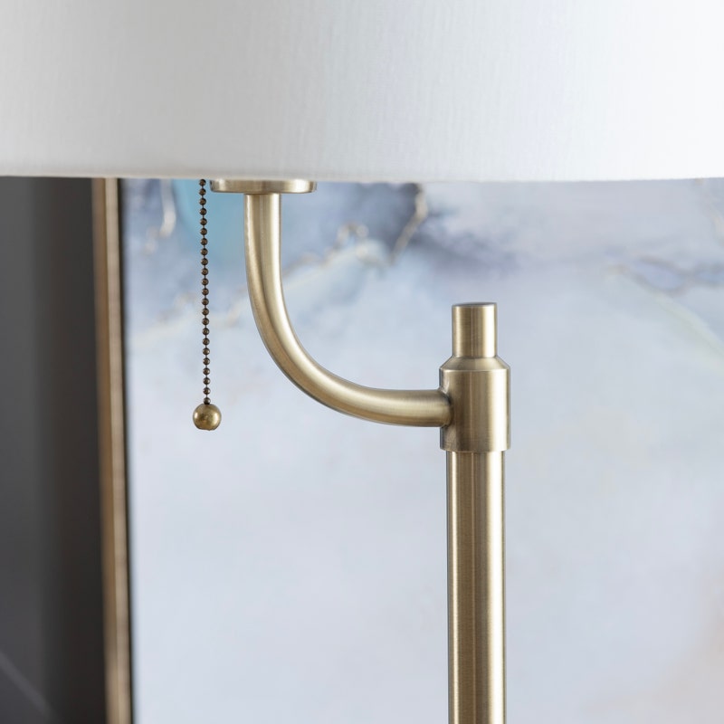 Crestview Collection Nash 66" Transitional Metal And Marble Floor Lamp In Honey Brass And White Marble Finish With Off White Linen Tapered Shade