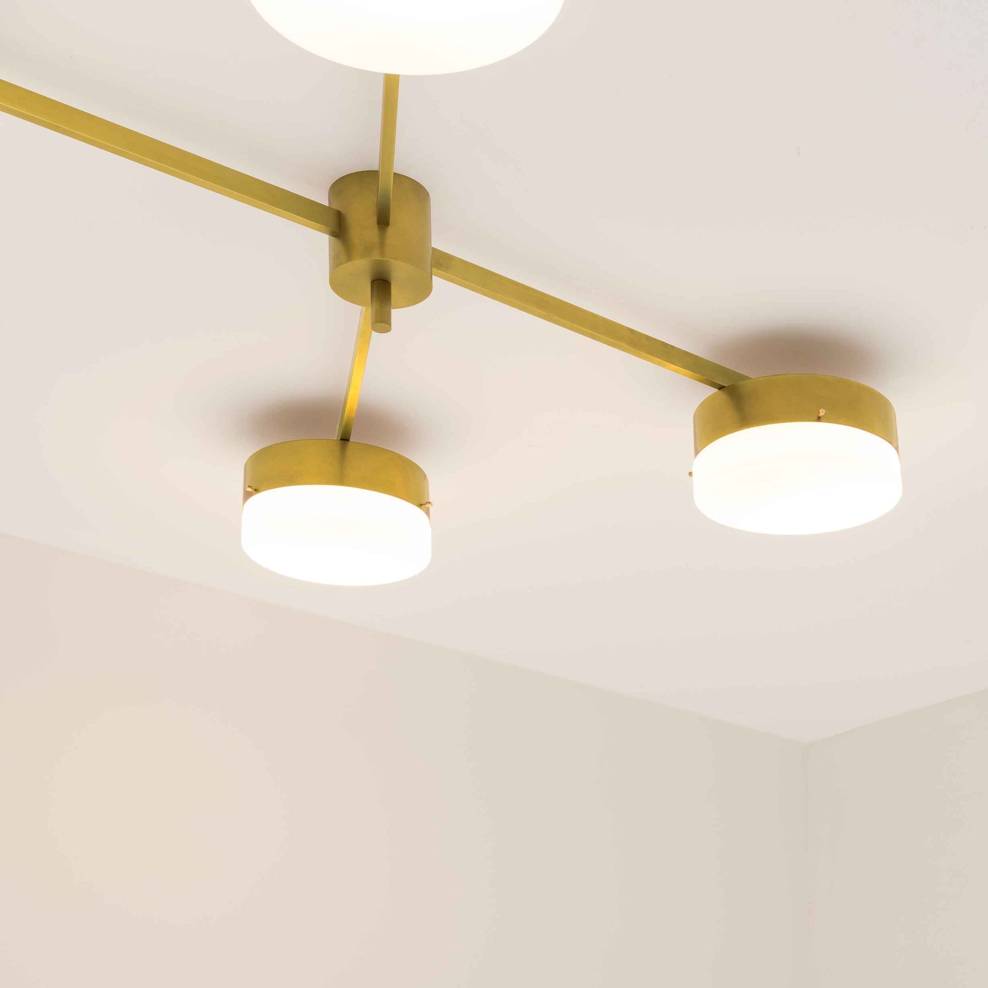 Design for Macha Celeste Aurora Ceiling or Wall-Mounted Unpolished Balanced Four-Armed Brass Lamp