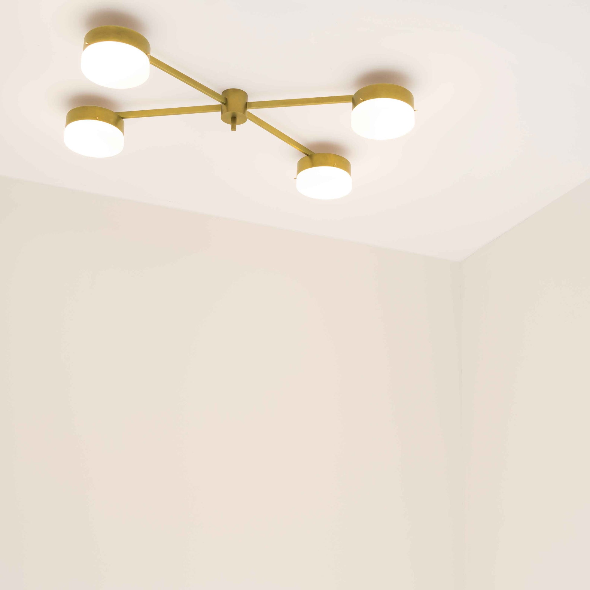 Design for Macha Celeste Aurora Ceiling or Wall-Mounted Unpolished Lucid Four-Armed Brass Lamp
