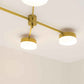Design for Macha Celeste Aurora Ceiling or Wall-Mounted Unpolished Lucid Four-Armed Brass Lamp