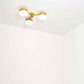 Design for Macha Celeste Epiphany Ceiling or Wall-Mounted Unpolished Balanced Three-Armed Brass Lamp