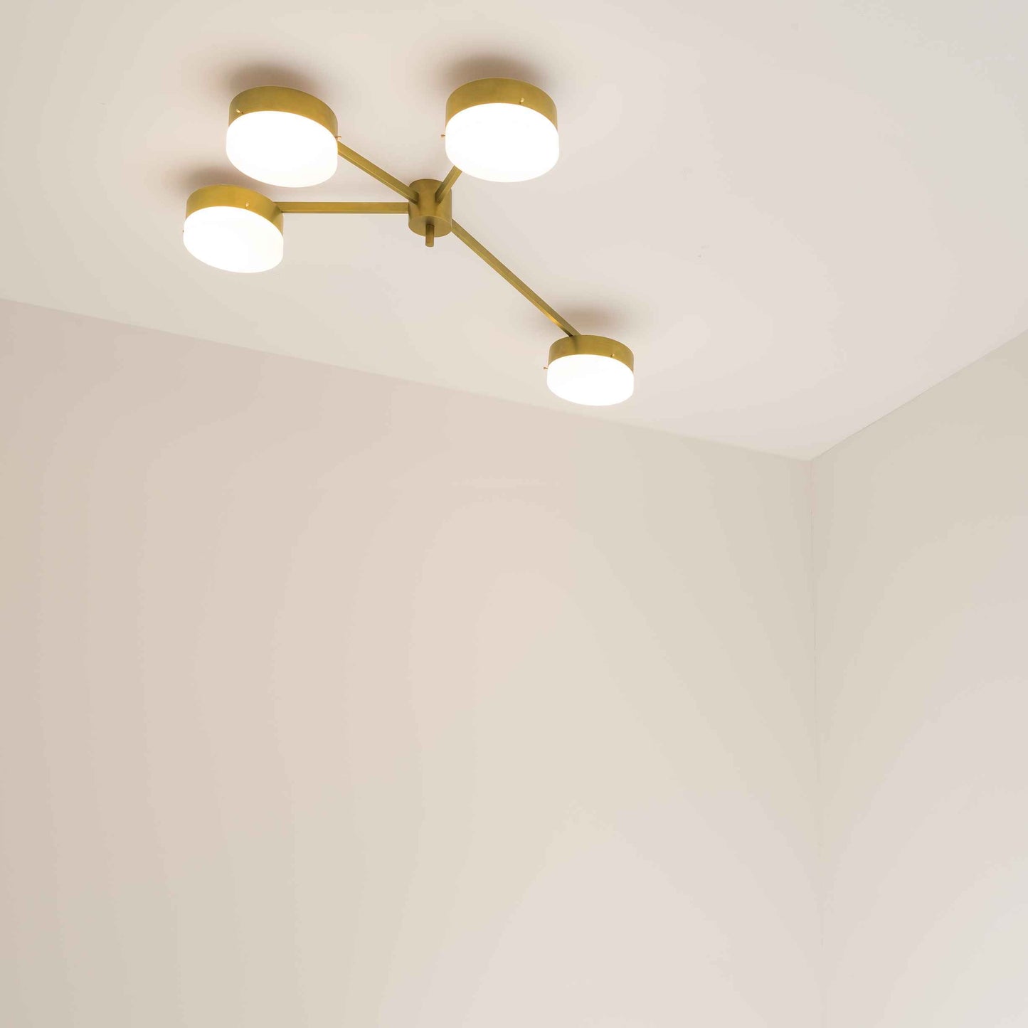 Design for Macha Celeste Incandescence Ceiling or Wall-Mounted Polished Four-Armed Brass Lamp