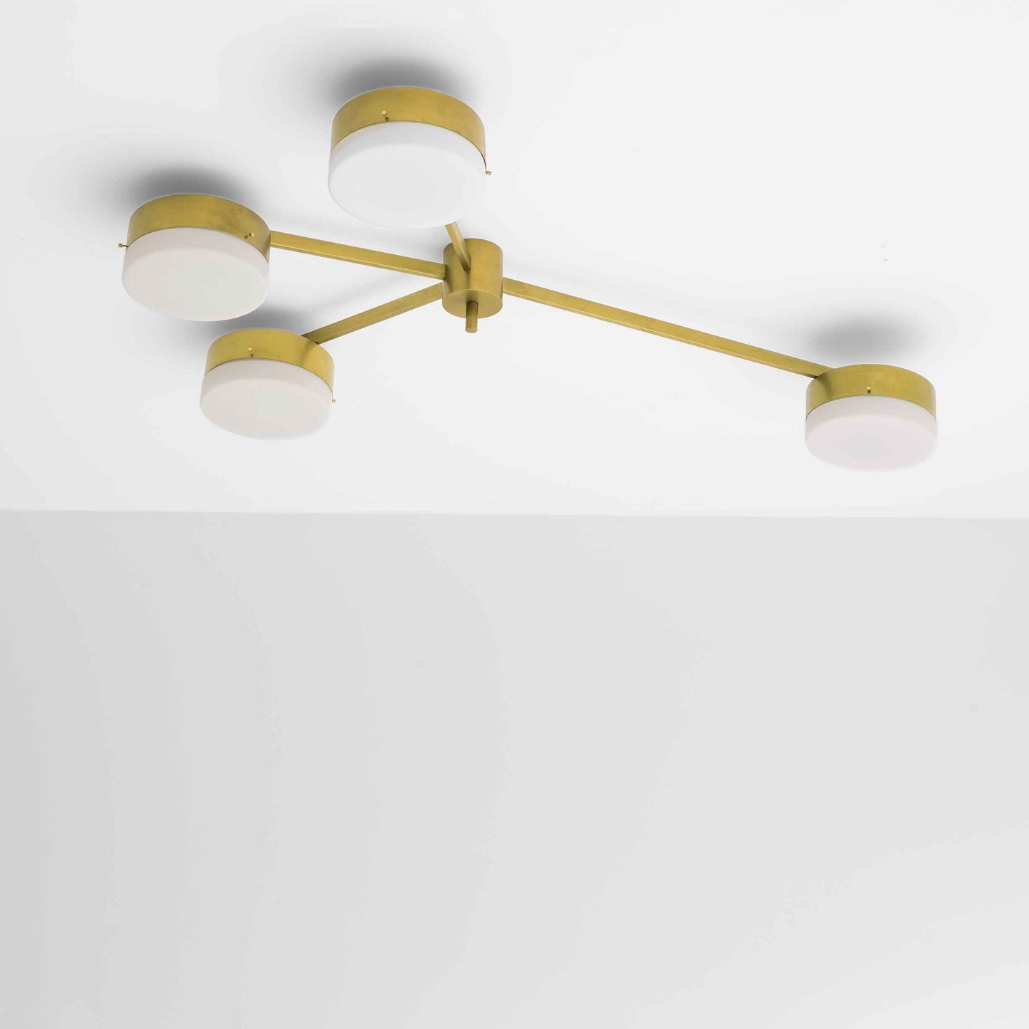 Design for Macha Celeste Incandescence Ceiling or Wall-Mounted Unpolished Lucid Four-Armed Brass Lamp