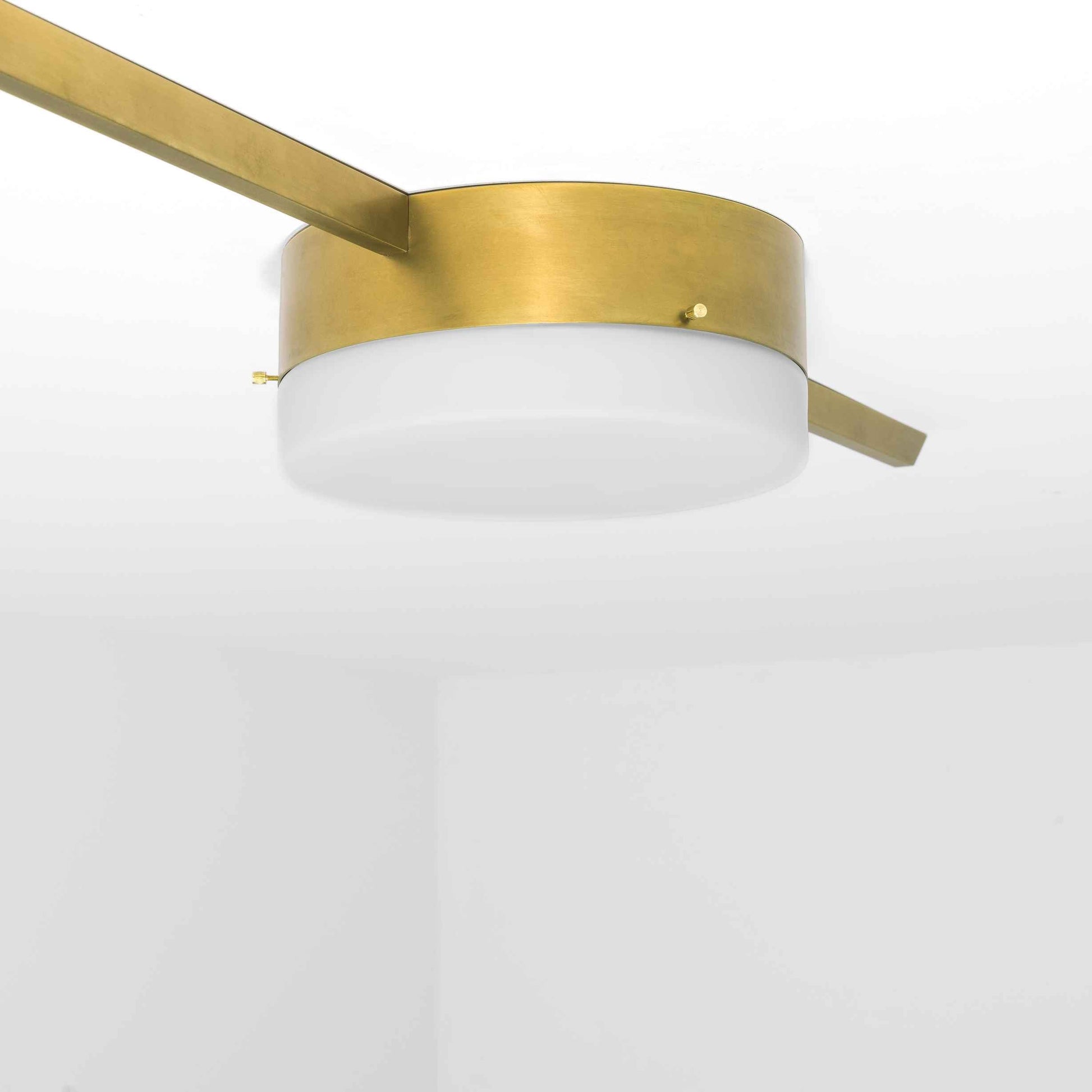 Design for Macha Celeste Solitude Ceiling or Wall-Mounted Unpolished Lucid One-Armed Brass Lamp