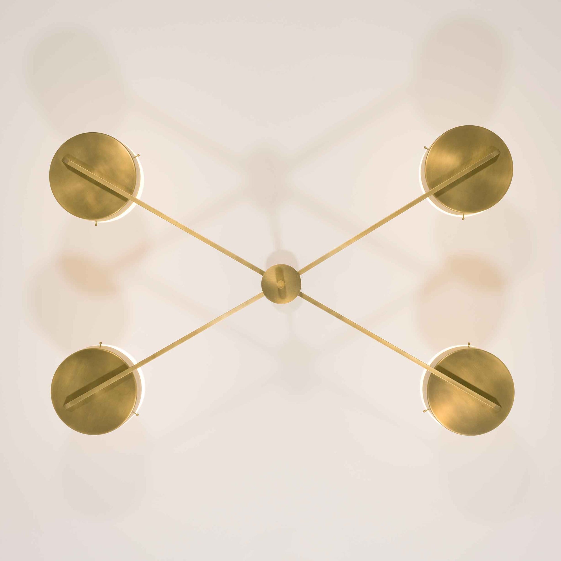 Design for Macha Celeste Supine Ceiling or Wall-Mounted Unpolished Balanced Four-Armed Brass Lamp