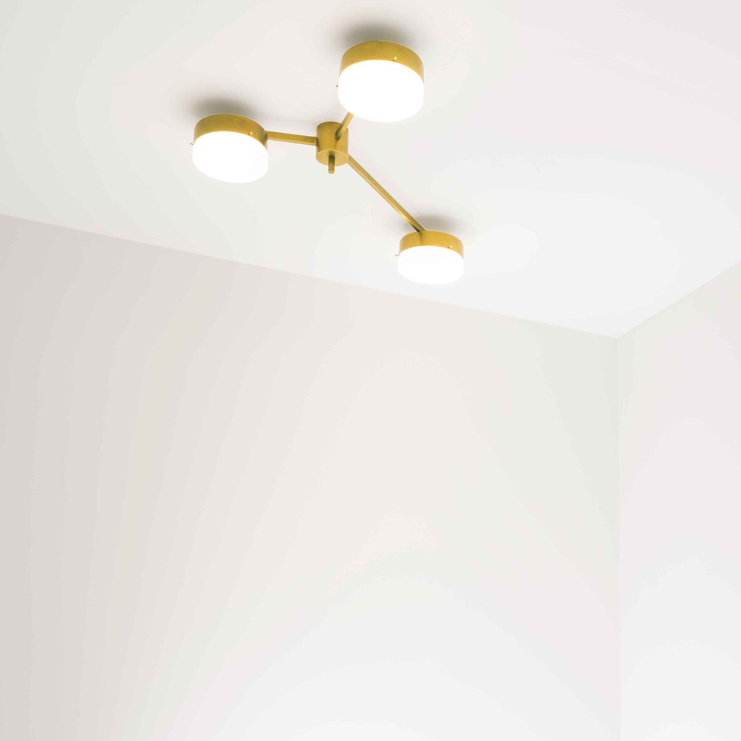 Design for Macha Celeste Syzygy Ceiling or Wall-Mounted Unpolished Balanced Three-Armed Brass Lamp