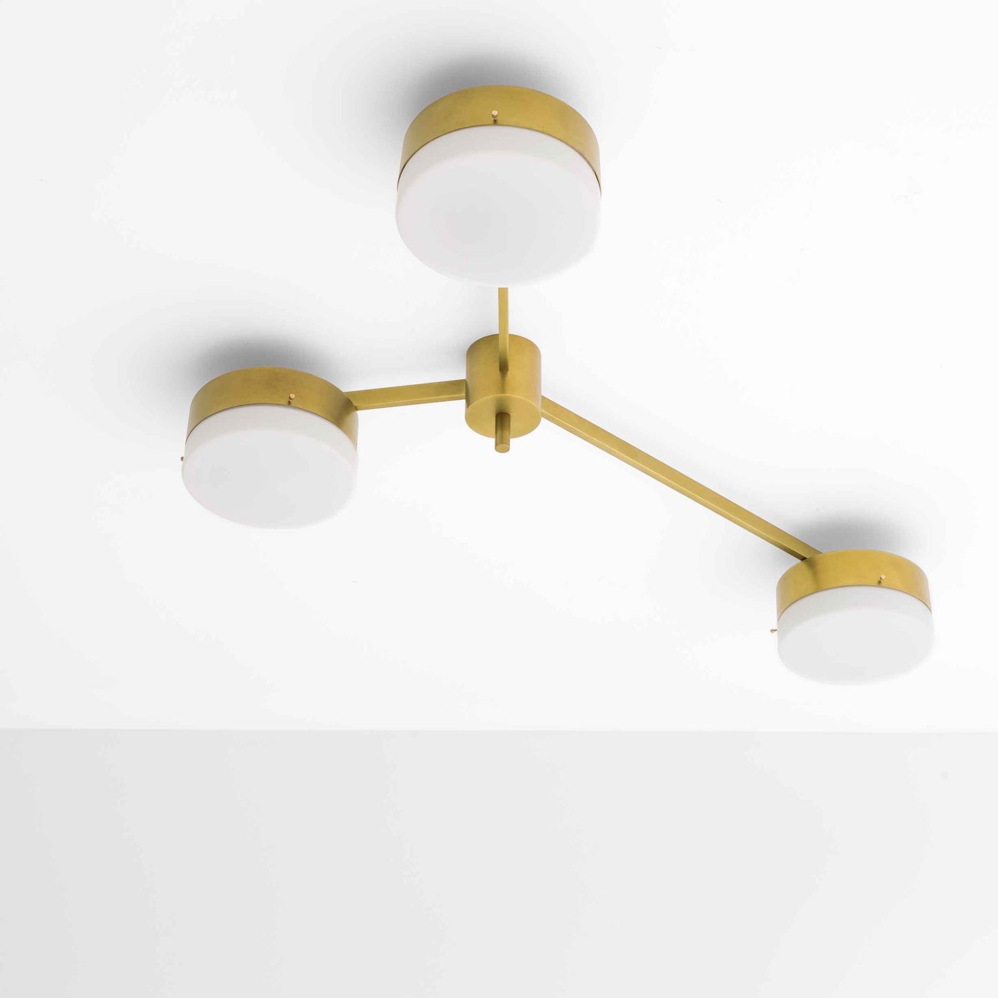 Design for Macha Celeste Syzygy Ceiling or Wall-Mounted Unpolished Balanced Three-Armed Brass Lamp