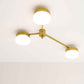 Design for Macha Celeste Syzygy Ceiling or Wall-Mounted Unpolished Lucid Three-Armed Brass Lamp