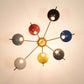 Design for Macha Helios Septem I Ceiling or Wall-Mounted Polished Seven-Armed Brass Lamp
