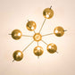 Design for Macha Helios Septem II Ceiling or Wall-Mounted Unpolished Opaque Seven-Armed Brass Lamp