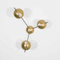 Design for Macha Helios Tribus II Ceiling or Wall-Mounted Blackened Three-Armed Brass Lamp