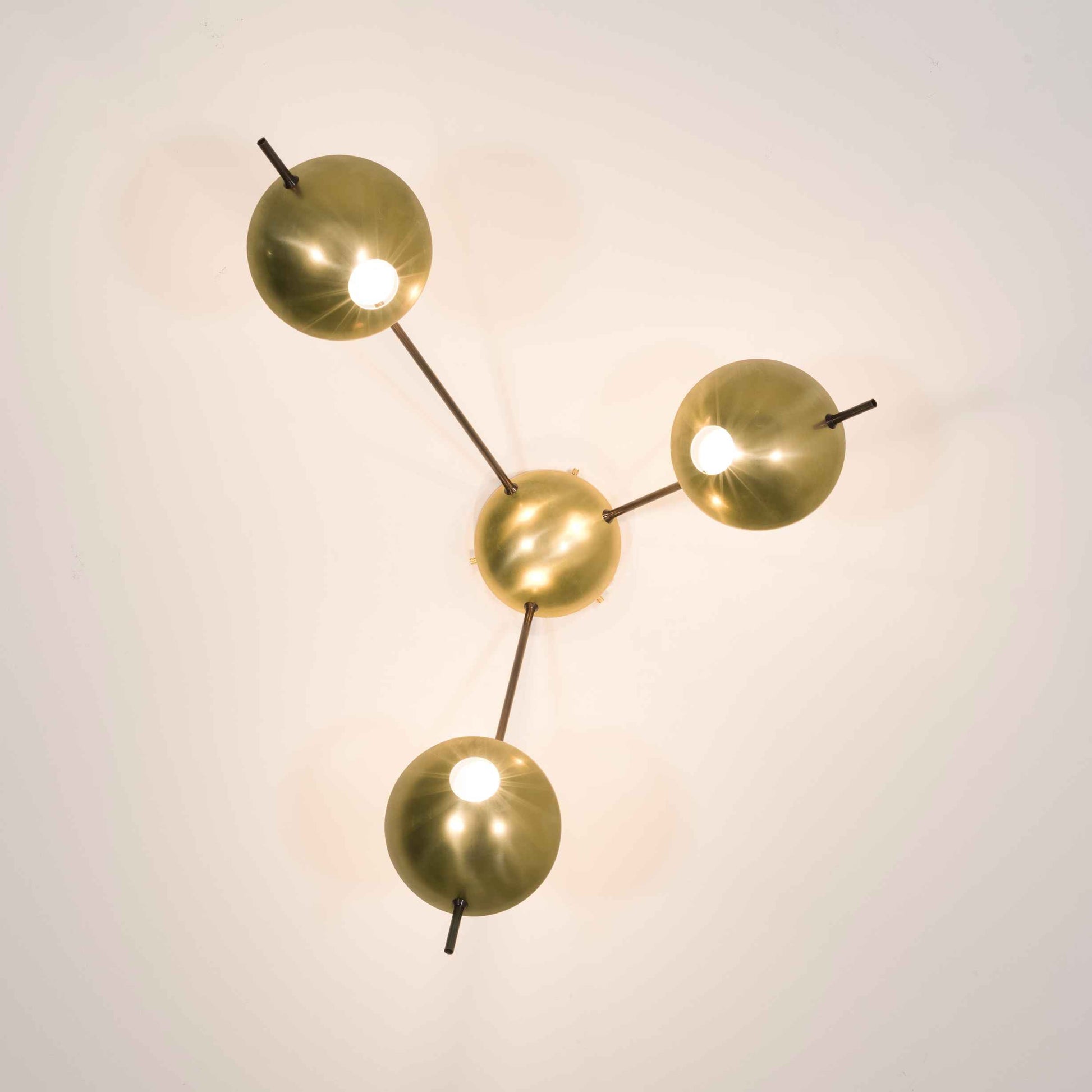 Design for Macha Helios Tribus II Ceiling or Wall-Mounted Unpolished Lucid Three-Armed Brass Lamp