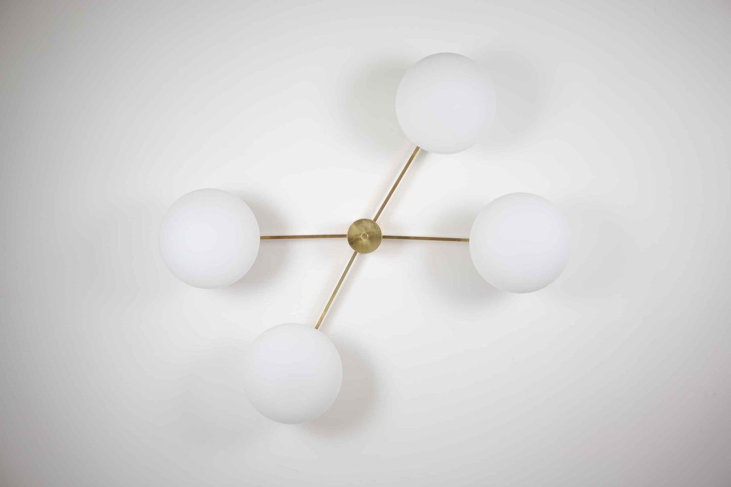 Design for Macha Stella Butterfly Ceiling or Wall-Mounted Unpolished Lucid Four-Armed Brass Lamp