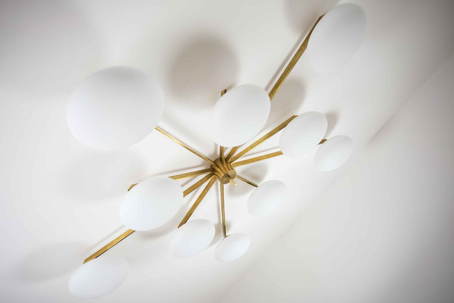 Design for Macha Stella Cosmos Ceiling or Wall-Mounted Bronze Ten-Armed Brass Lamp