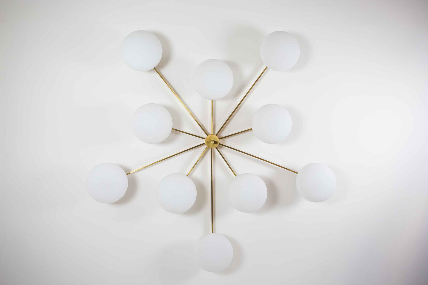 Design for Macha Stella Cosmos Ceiling or Wall-Mounted Unpolished Balanced Ten-Armed Brass Lamp