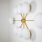 Design for Macha Stella Evening Ceiling or Wall-Mounted Blackened Eight-Armed Brass Lamp
