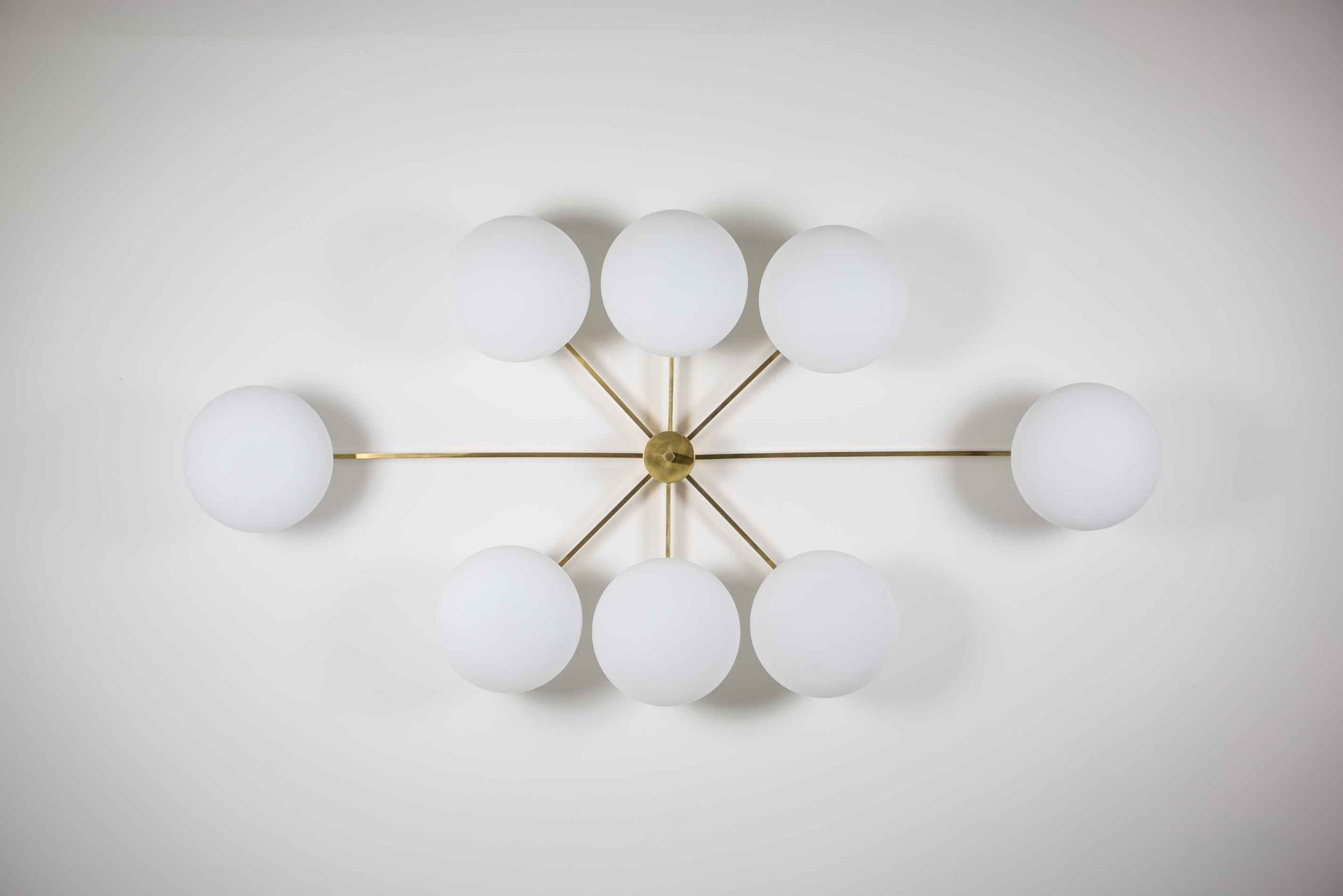 Design for Macha Stella Evening Ceiling or Wall-Mounted Polished Eight-Armed Brass Lamp