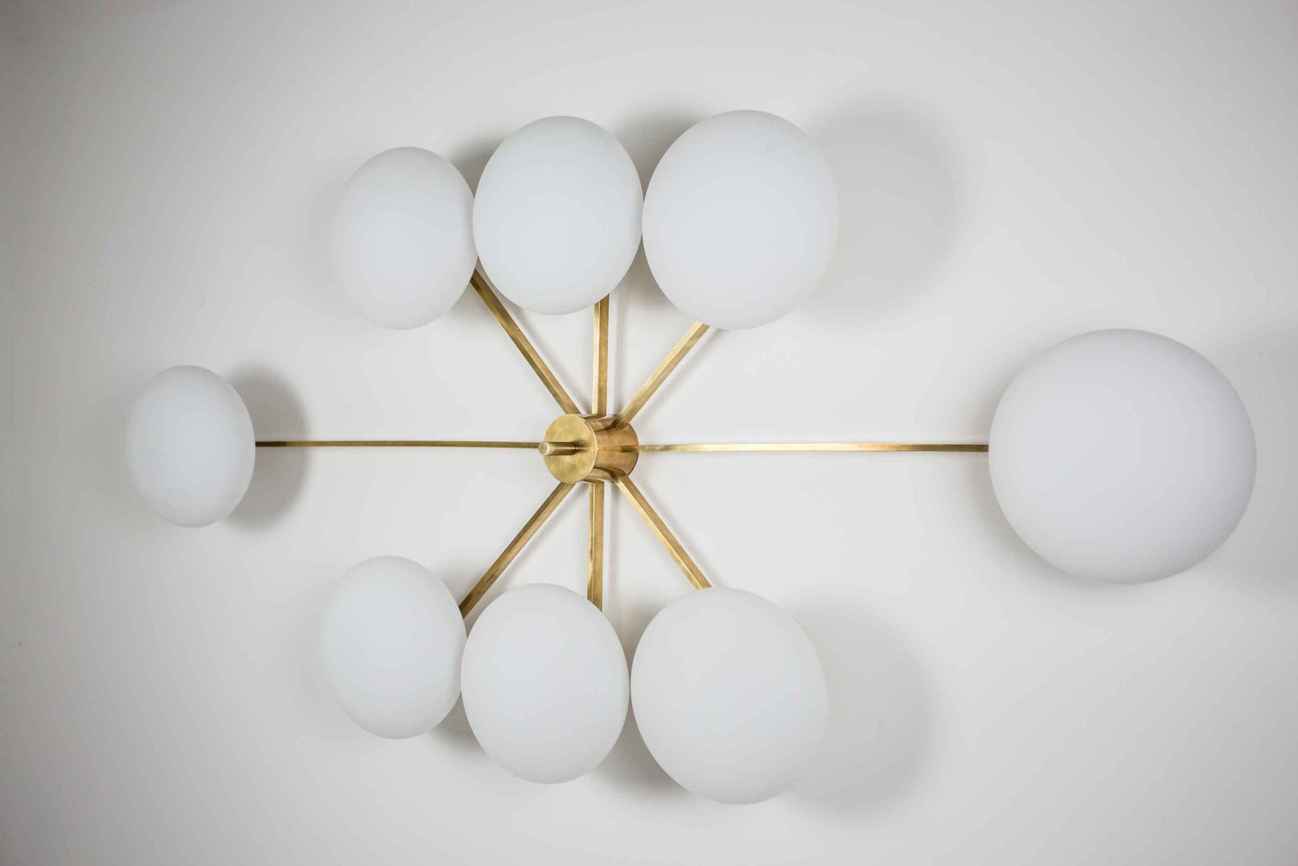 Design for Macha Stella Evening Ceiling or Wall-Mounted Unpolished Balanced Eight-Armed Brass Lamp