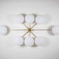 Design for Macha Stella Evening Ceiling or Wall-Mounted Unpolished Lucid Eight-Armed Brass Lamp