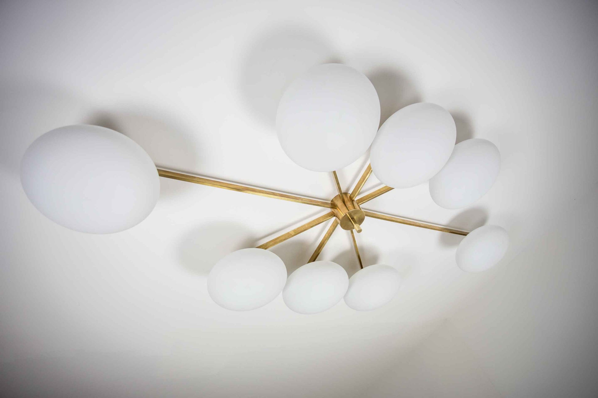 Design for Macha Stella Evening Ceiling or Wall-Mounted Unpolished Opaque Eight-Armed Brass Lamp