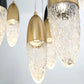 Eurofase Lighting Ecrou 30" 12-Light Dimmable Halogen Matte Black & Gold Chandelier With Textured Clear Glass Shades