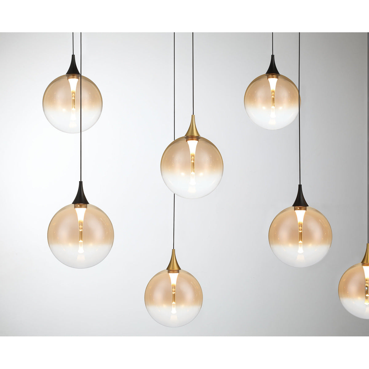Eurofase Lighting Iissa 72" 14-Light Integrated LED Amber Glass Shade Gold and Black Steel Multi-Drop Chandelier