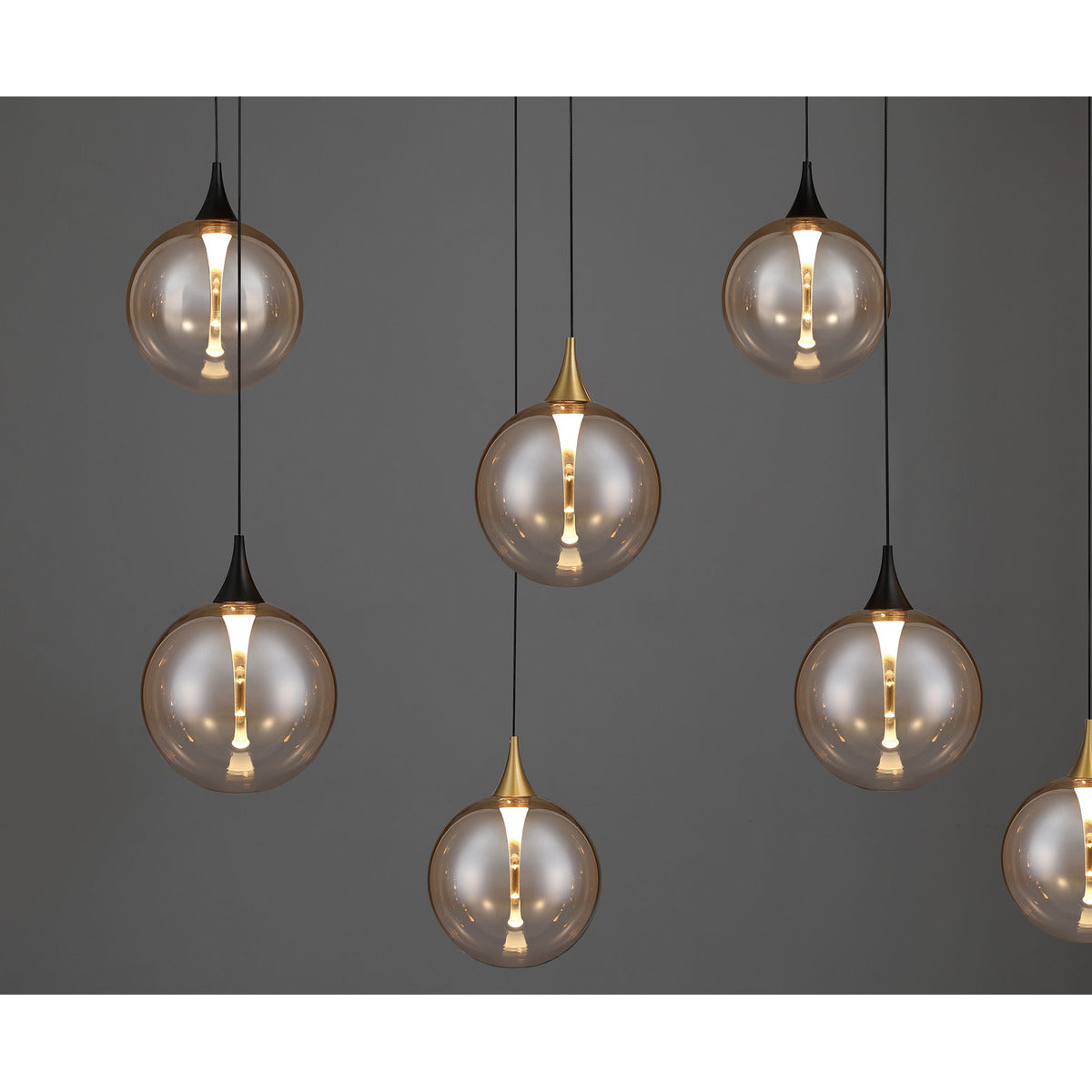 Eurofase Lighting Iissa 72" 14-Light Integrated LED Amber Glass Shade Gold and Black Steel Multi-Drop Chandelier