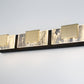 Eurofase Lighting Kasha 28" 3-Light Dimmable LED Gold & Black Metal Bath Bar With Clear & Smoke Pattern Shades