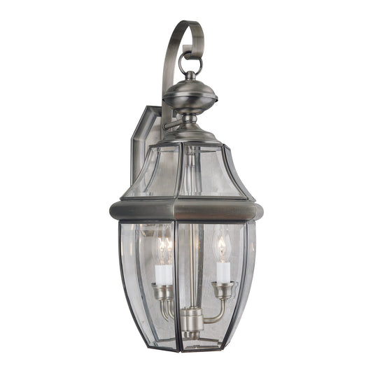 Forte Lighting Cambridge 10" 2-Light Brass Antique Pewter Outdoor Wall Light With Clear Beveled Glass Panel Shade