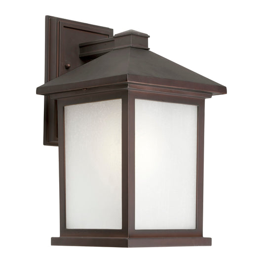 Forte Lighting Cardiff 8" 1-Light Fluorescent Die Cast Aluminum Antique Bronze Outdoor Wall Light With Frosted Seeded Glass Panels Shade